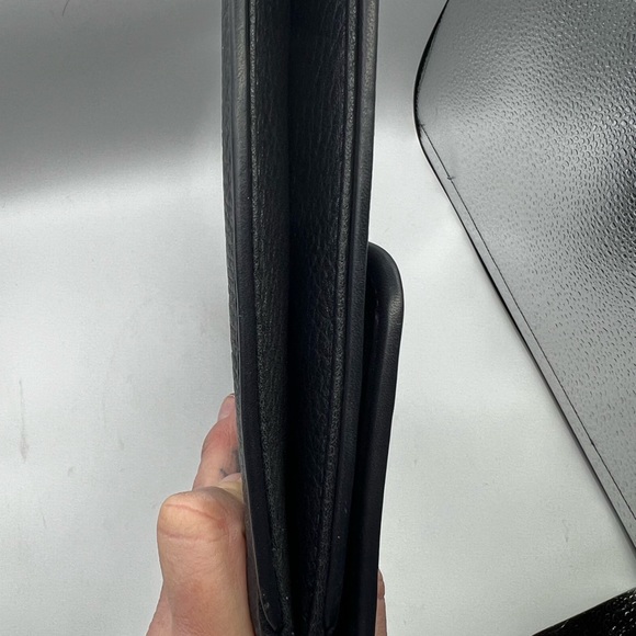 Burberry black grained leather laptop/tablet clutch.